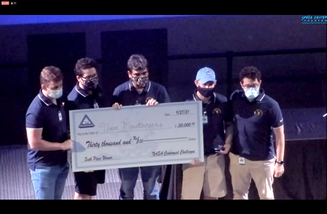 Team Mountaineers with $30,000 check